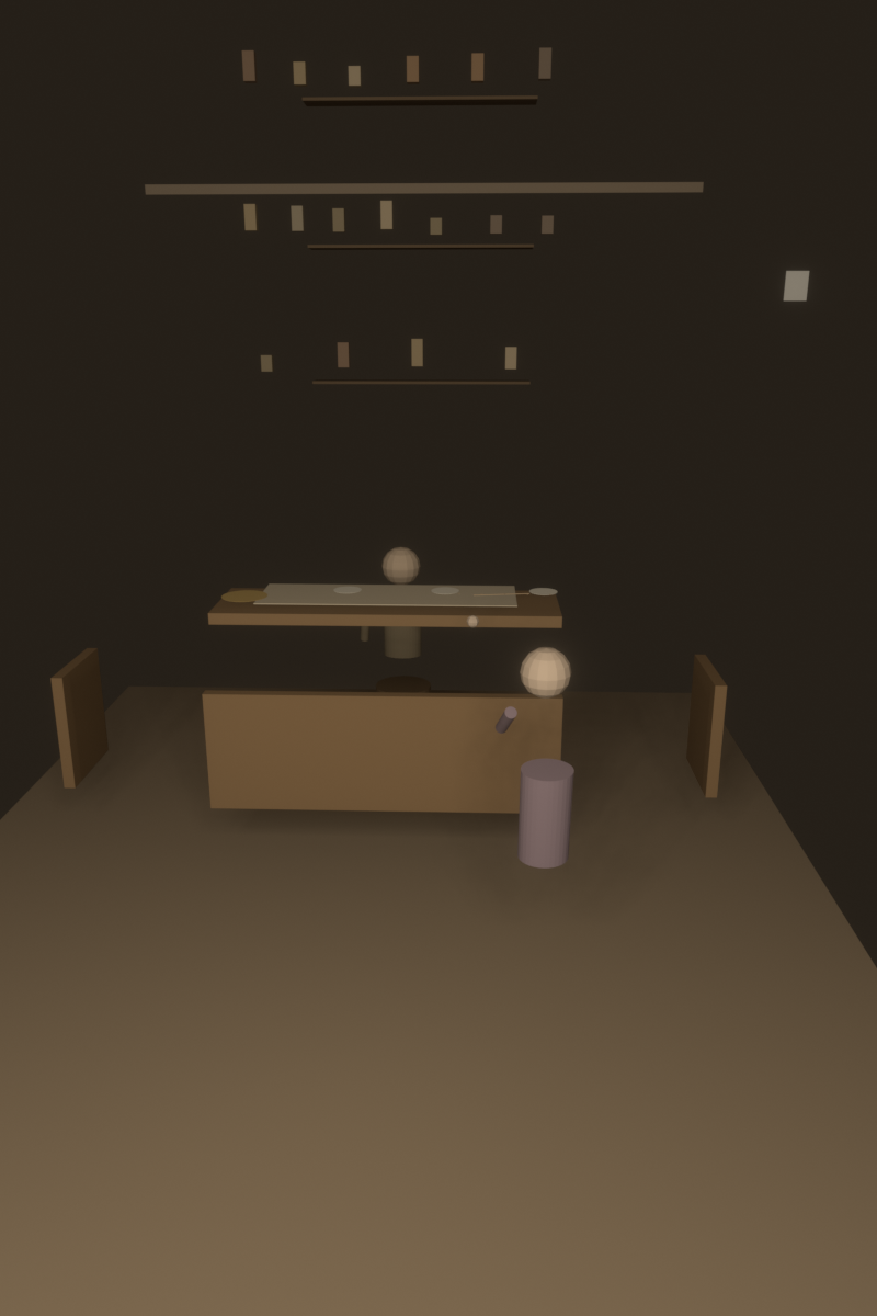 A small shop interior, seen from just inside the doorway. Afternoon light falls across a worn counter. The cloth — tea-stained, clumsily mended, rubbed thin where a boy counted coins — is the centre of the image. No light-rivers. Just a shop, and a cloth that held.